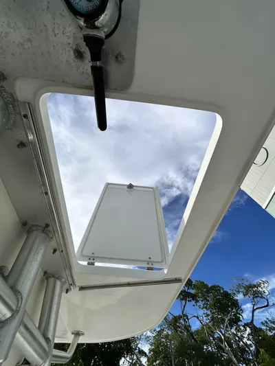 Crank It Up Yacht Photos Pics View through the sunroof of a 2006 Boston Whaler 320 Outrage.