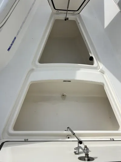 Crank It Up Yacht Photos Pics Storage compartments in 2006 Boston Whaler 320 Outrage boat.