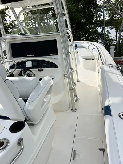 Crank It Up Yacht Photos Pics Interior view of a 2006 Boston Whaler 320 Outrage boat.