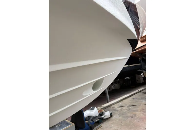  Yacht Photos Pics Close-up of 2005 Cantieri di Sarnico 50 yacht hull in a workshop.