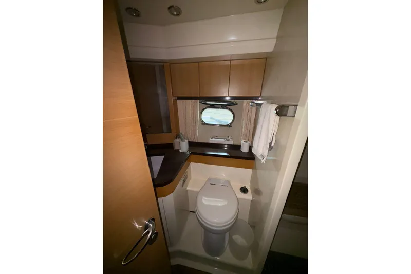  Yacht Photos Pics Bathroom interior of 2005 Cantieri di Sarnico 50 yacht, featuring modern amenities.