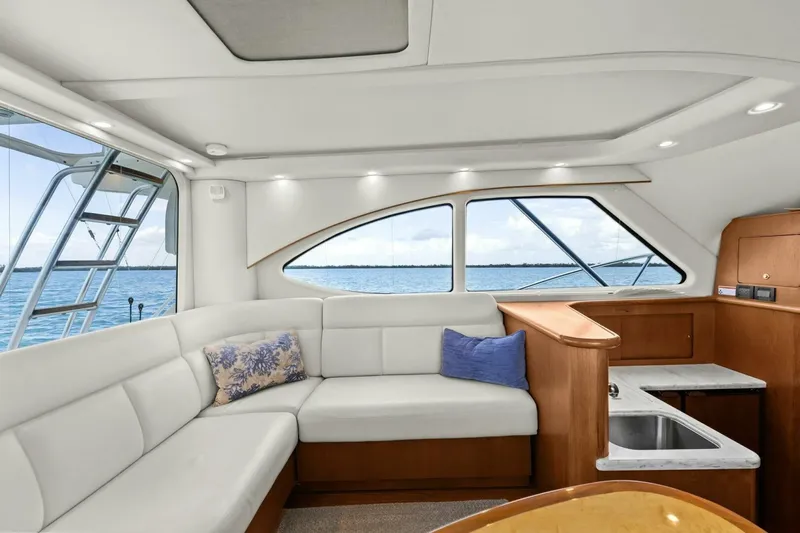 Salty Dach Yacht Photos Pics Luxurious interior of 2013 Tiara Yachts 3900 Convertible with ocean view.