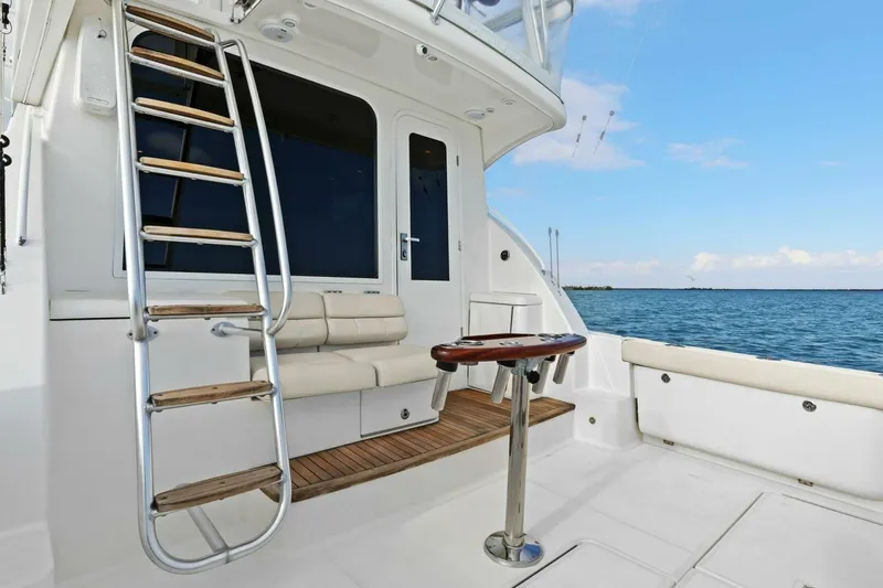 Salty Dach Yacht Photos Pics 2013 Tiara Yachts 3900 Convertible boat deck with seating and ocean view.