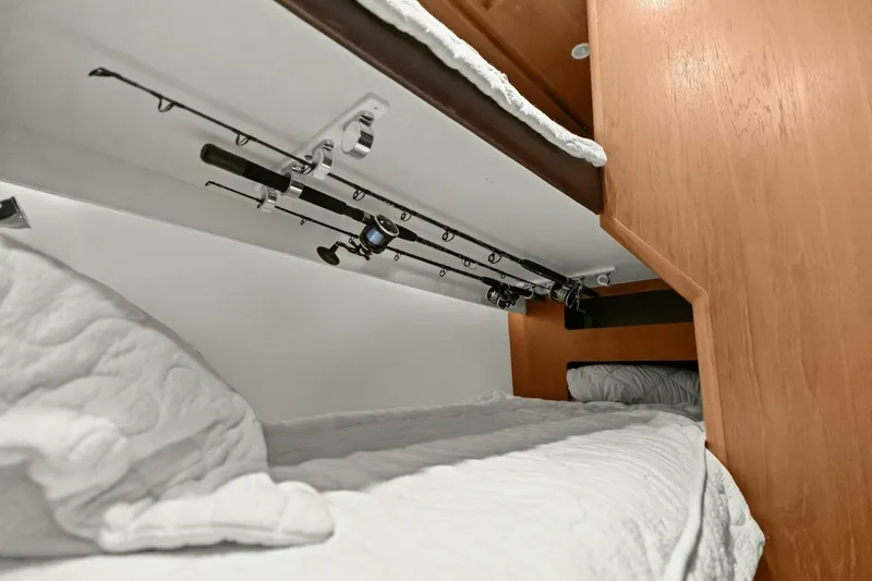 Salty Dach Yacht Photos Pics Bunk beds with fishing rod storage in 2013 Tiara Yachts 3900 Convertible.
