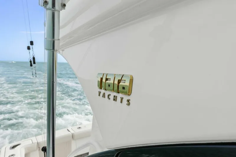 Salty Dach Yacht Photos Pics 2013 Tiara Yachts 3900 Convertible on ocean, logo detail.