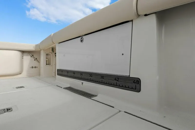 Salty Dach Yacht Photos Pics 2013 Tiara Yachts 3900 Convertible deck with built-in ruler and storage compartment.