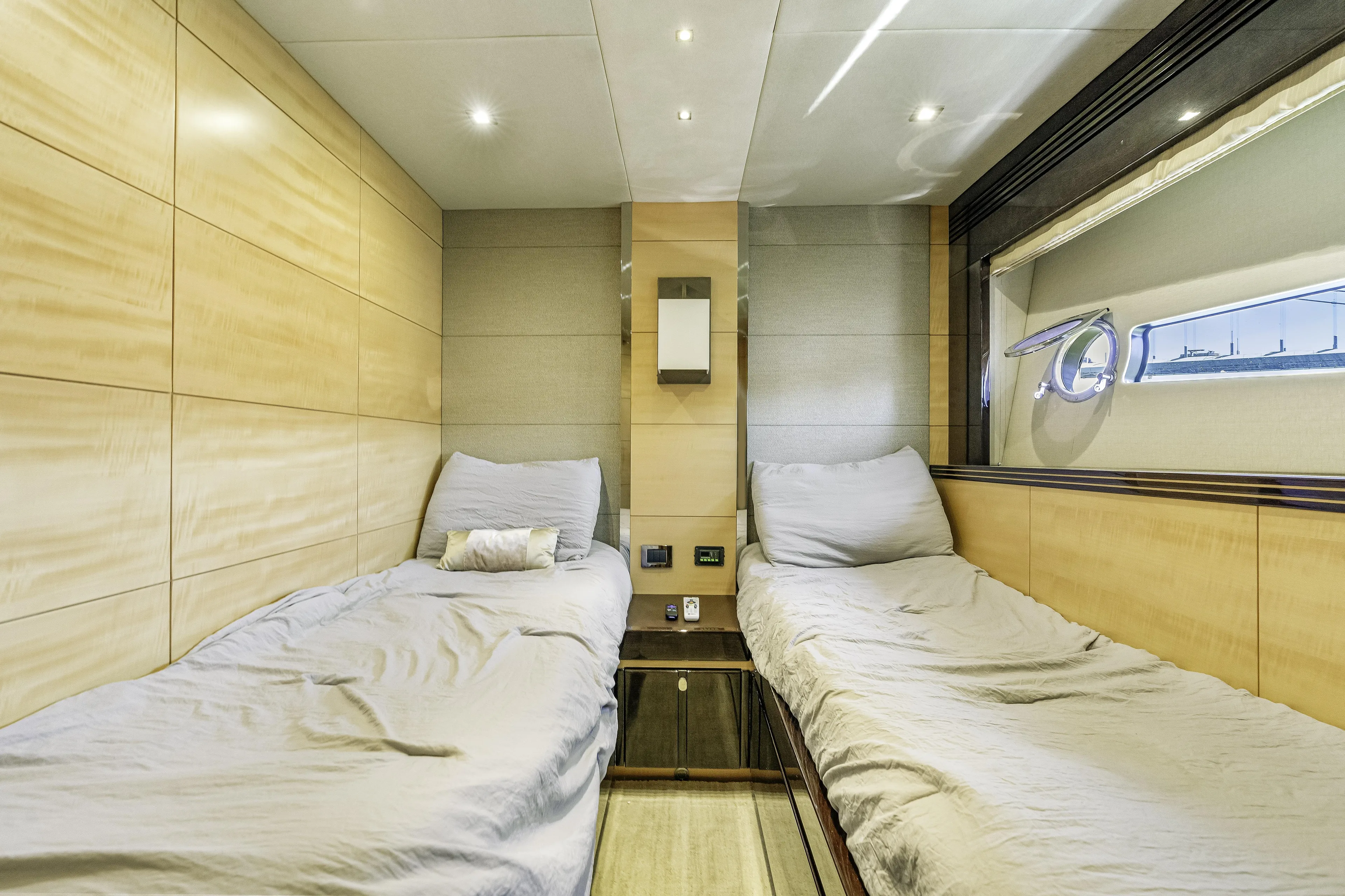  Yacht Photos Pics Interior of 2014 Sunseeker 68 Sport Yacht cabin with twin beds and modern design.