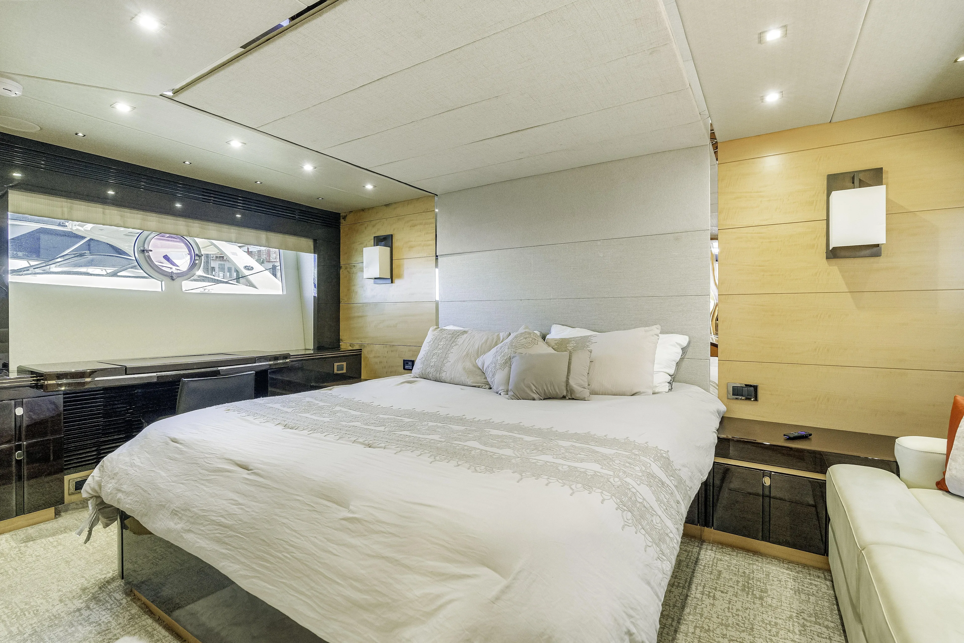  Yacht Photos Pics Luxurious bedroom interior of 2014 Sunseeker 68 Sport Yacht with modern design and elegant furnishings.