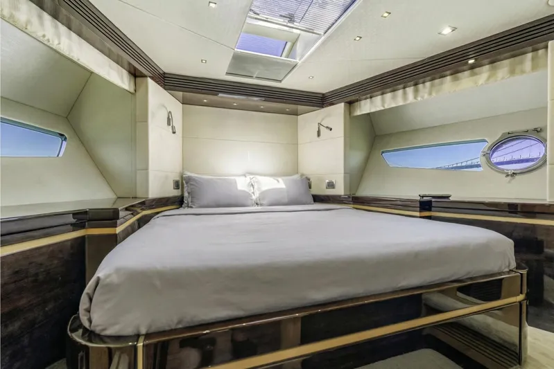  Yacht Photos Pics Luxurious bedroom interior of 2014 Sunseeker Predator 68 yacht with modern design.