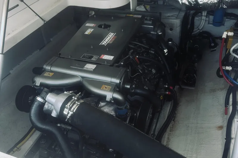 Sister's Yacht Photos Pics Engine compartment of a 2013 Back Cove 30 boat featuring a Yanmar engine.