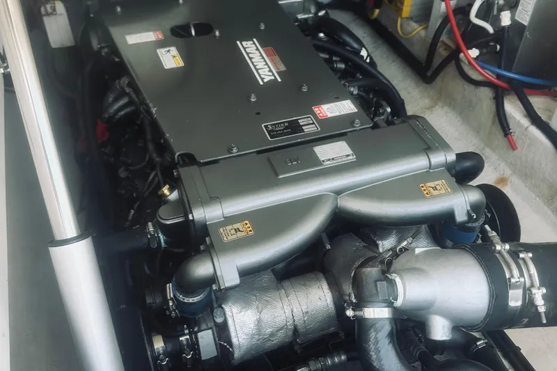 Sister's Yacht Photos Pics Engine compartment of a 2013 Back Cove 30 boat featuring a Yanmar engine.