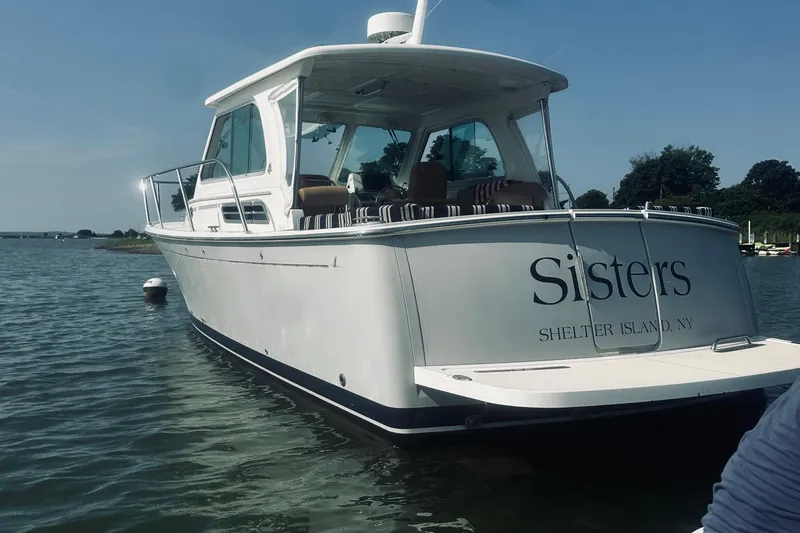 Sister's Yacht Photos Pics 2013 Back Cove 30 boat named "Sisters" on water near Shelter Island, NY.