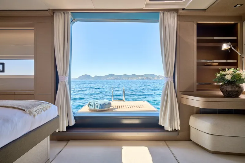  Yacht Photos Pics Luxurious interior of 2023 Lagoon Seventy 7 yacht with ocean view.