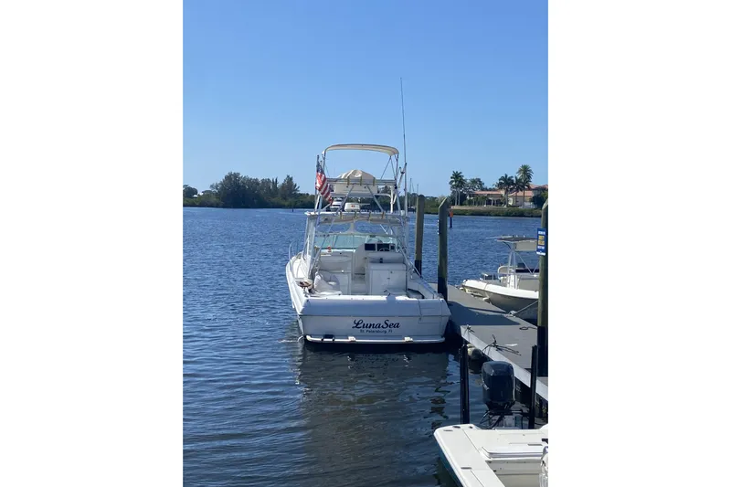  Yacht Photos Pics 2005 Stamas 370 Express docked on a sunny day, with clear blue skies.