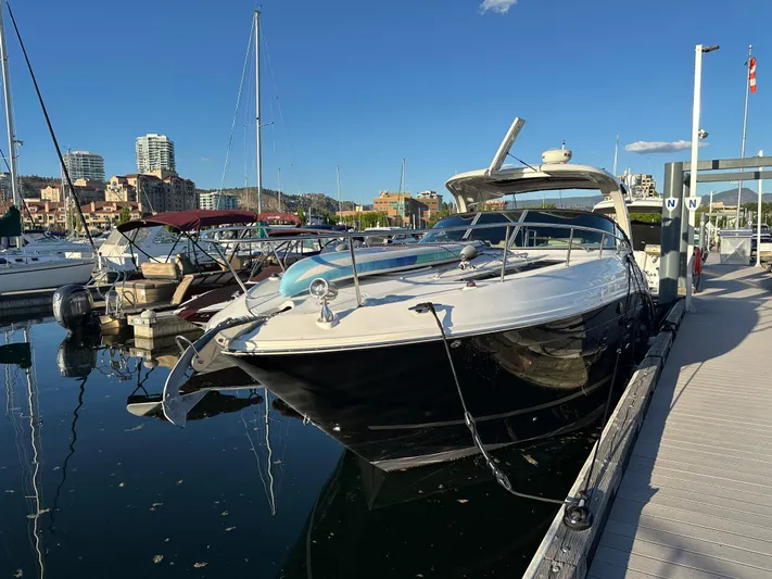 Andiamo Yacht Photos Pics 2016 Sea Ray 350 Sundancer docked at marina under clear blue sky.
