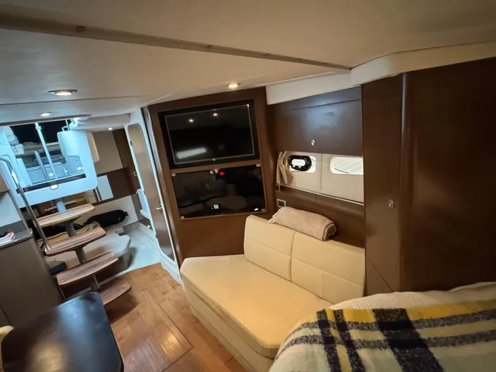 Andiamo Yacht Photos Pics Interior of 2016 Sea Ray 350 Sundancer yacht with modern seating and entertainment area.