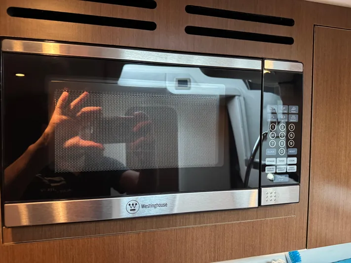 Andiamo Yacht Photos Pics Westinghouse microwave in 2016 Sea Ray 350 Sundancer yacht kitchen.