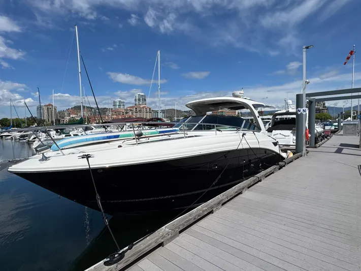Andiamo Yacht Photos Pics 2016 Sea Ray 350 Sundancer docked at marina under clear blue sky.