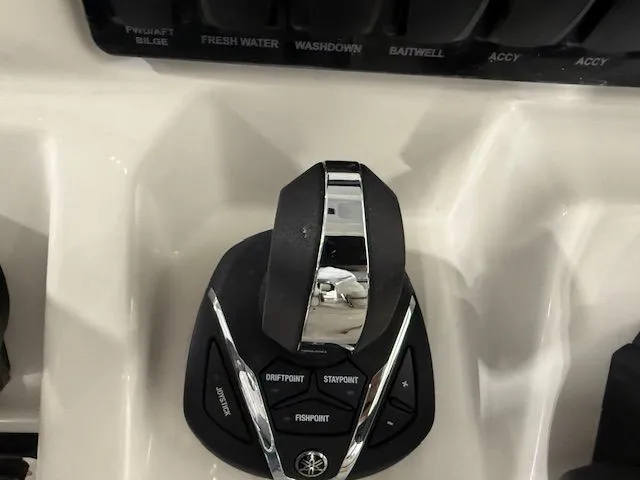  Yacht Photos Pics Throttle control panel on 2022 Sailfish 290cc boat, featuring various function buttons.