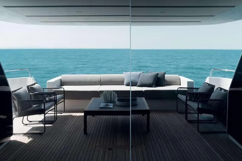  Yacht Photos Pics Luxurious 2022 Sanlorenzo SL86 yacht deck with ocean view and elegant seating.
