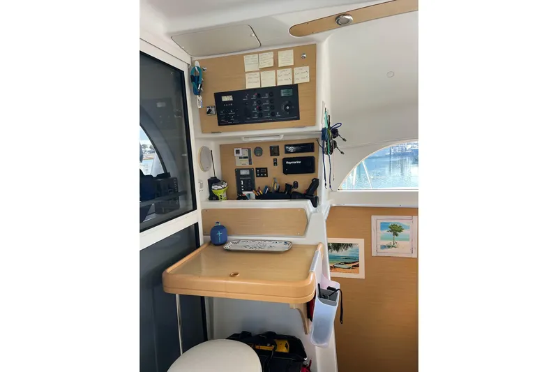 Apres-sea Yacht Photos Pics Interior of 2012 Lagoon 380 S2 yacht with navigation equipment and decor.