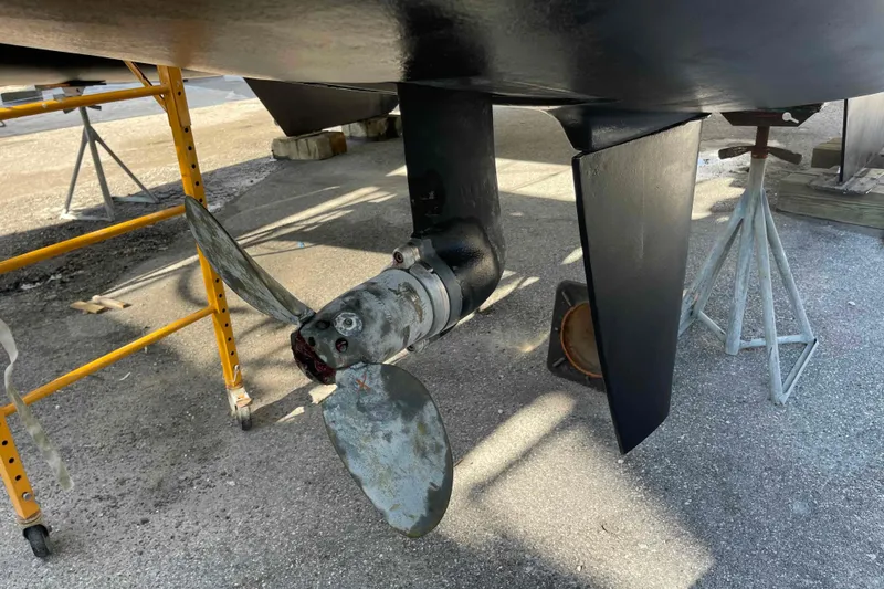 Apres-sea Yacht Photos Pics Propeller and rudder of 2012 Lagoon 380 S2 catamaran on dry dock.