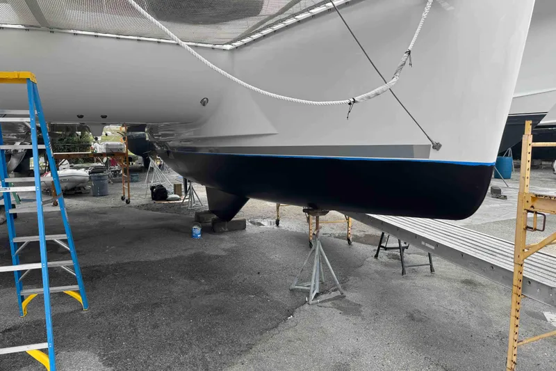 Apres-sea Yacht Photos Pics 2012 Lagoon 380 S2 catamaran in dry dock, undergoing maintenance and inspection.