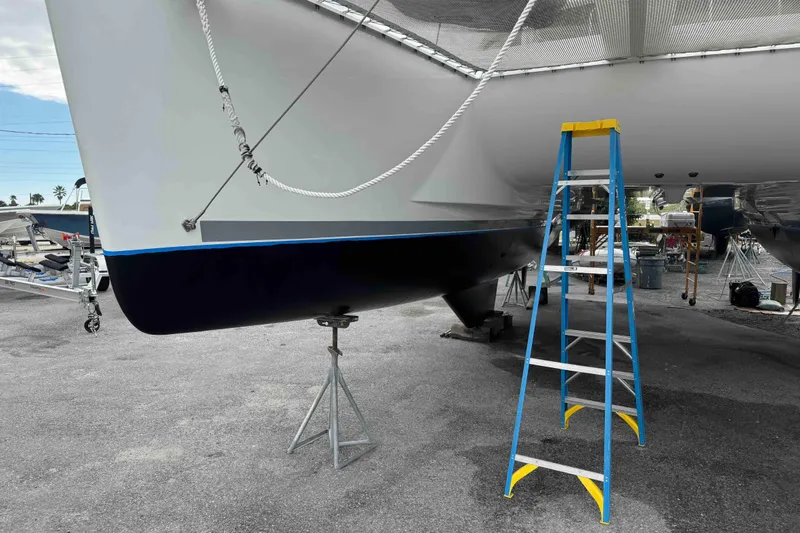 Apres-sea Yacht Photos Pics 2012 Lagoon 380 S2 catamaran on dry dock with ladder for maintenance.