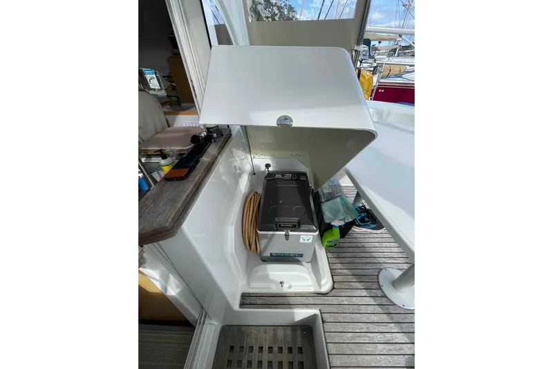 Apres-sea Yacht Photos Pics Interior of 2012 Lagoon 380 S2 yacht with storage compartment open.