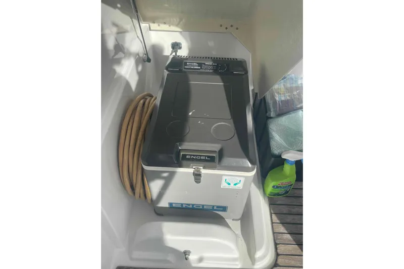 Apres-sea Yacht Photos Pics Engel cooler on 2012 Lagoon 380 S2 yacht with cleaning supplies and hose.