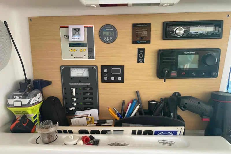 Apres-sea Yacht Photos Pics Control panel of a 2012 Lagoon 380 S2 catamaran with navigation and communication equipment.