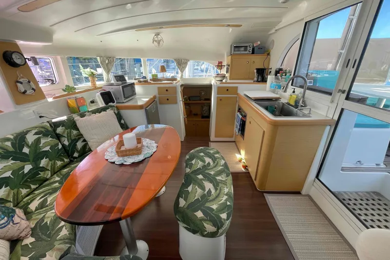 Apres-sea Yacht Photos Pics Interior of 2012 Lagoon 380 S2 catamaran with kitchen and dining area.
