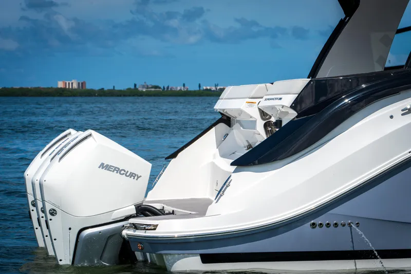  Yacht Photos Pics 2023 Sea Ray Sundancer 370 OB with Mercury outboard engines on the water.