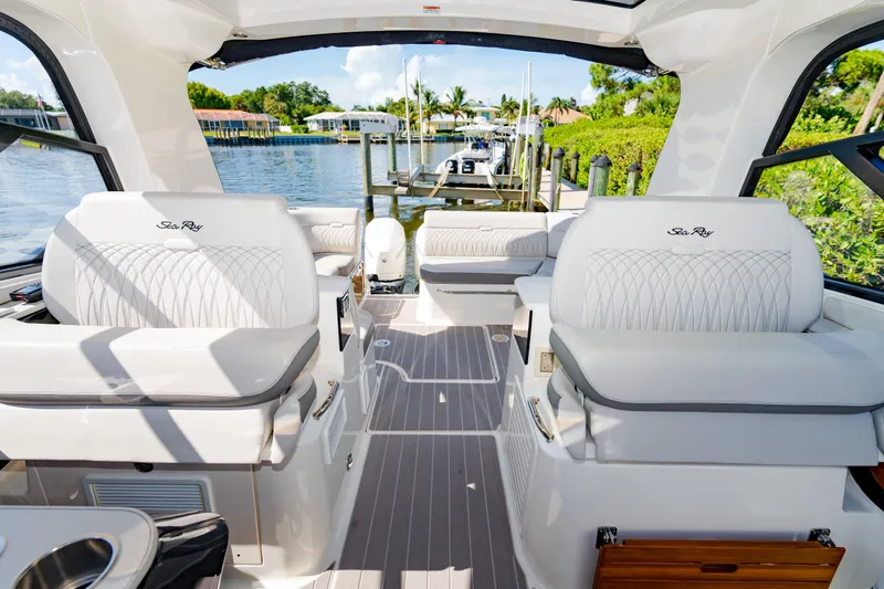  Yacht Photos Pics 2023 Sea Ray Sundancer 370 OB interior with waterfront view.