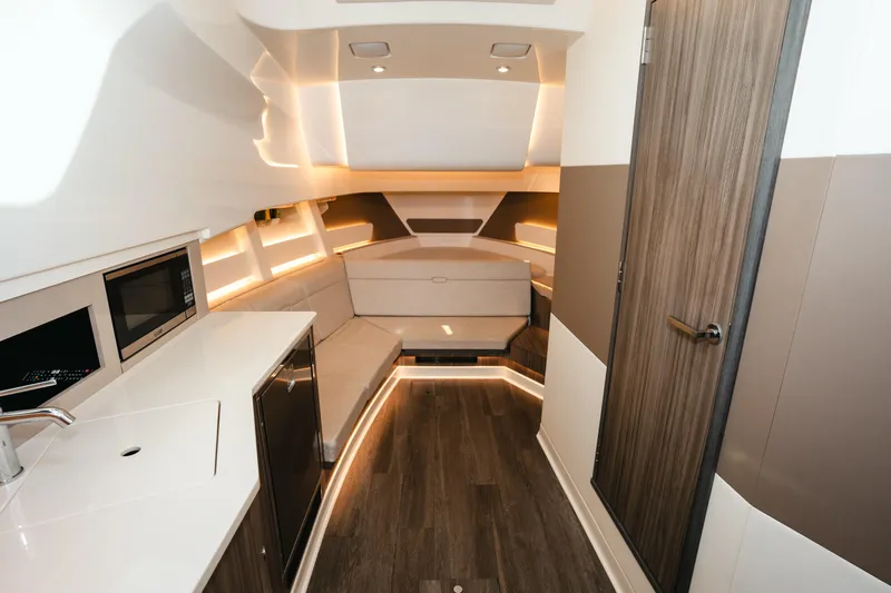  Yacht Photos Pics Interior of 2023 Sea Ray Sundancer 370 OB with modern kitchen and seating area.