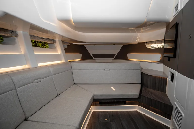  Yacht Photos Pics Modern interior of 2023 Sea Ray Sundancer 370 OB with sleek seating and ambient lighting.