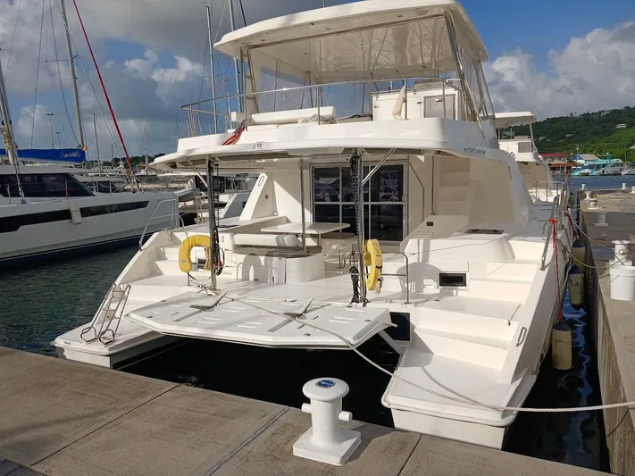 Whimsea II Yacht Photos Pics 2018 Leopard 51 Powercat docked at marina, rear view.