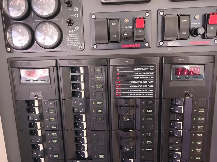 Whimsea II Yacht Photos Pics Control panel of a 2018 Leopard 51 Powercat with gauges and switches.