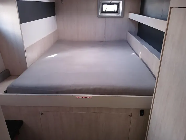 Whimsea II Yacht Photos Pics 2018 Leopard 51 Powercat cabin with bed and window.