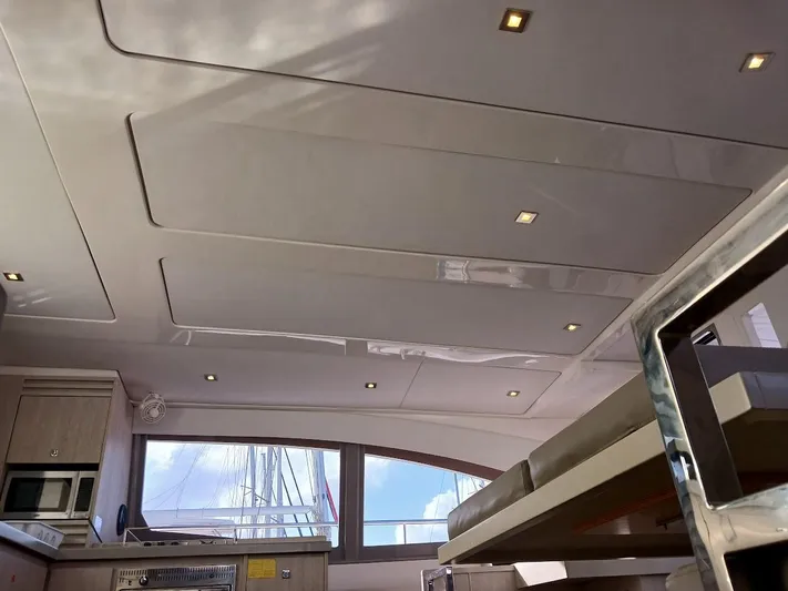 Whimsea II Yacht Photos Pics Interior of 2018 Leopard 51 Powercat yacht with modern design and ceiling lights.