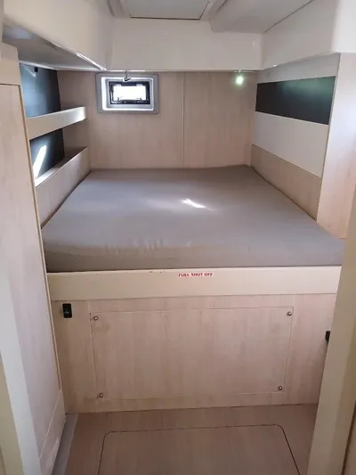 Whimsea II Yacht Photos Pics Interior cabin of 2018 Leopard 51 Powercat with bed and storage.