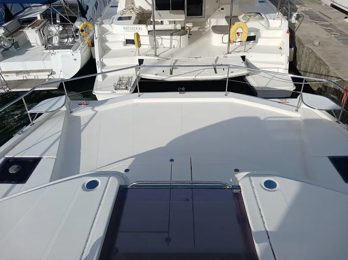 Whimsea II Yacht Photos Pics 2018 Leopard 51 Powercat yacht docked at marina, view from deck.