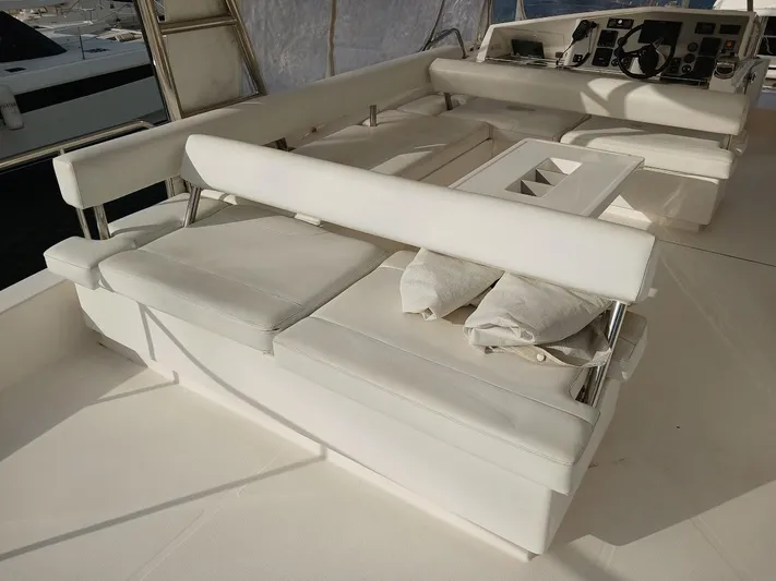 Whimsea II Yacht Photos Pics Luxurious seating area on 2018 Leopard 51 Powercat yacht deck.