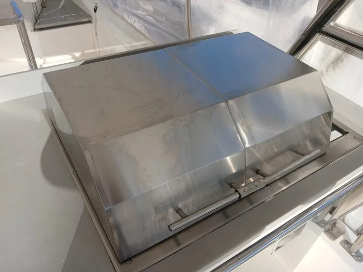 Whimsea II Yacht Photos Pics Stainless steel grill on 2018 Leopard 51 Powercat yacht deck.