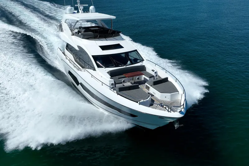 Do It Anyway Yacht Photos Pics 2018 Sunseeker 76 Yacht cruising on open water, showcasing luxury and speed.