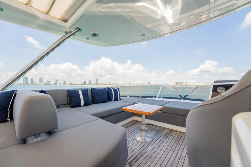 Do It Anyway Yacht Photos Pics Luxurious Sunseeker 76 Yacht 2018 with spacious deck and stunning ocean view.