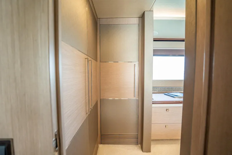 Do It Anyway Yacht Photos Pics Interior of 2018 Sunseeker 76 Yacht, featuring elegant wood paneling and modern design.