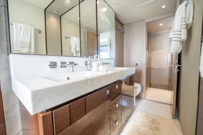 Do It Anyway Yacht Photos Pics Luxurious bathroom in 2018 Sunseeker 76 Yacht with elegant fixtures and modern design.