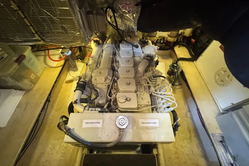 Rafiki Yacht Photos Pics Engine room of a 2000 Nordic Tug 37, showcasing the vessel's engine and components.