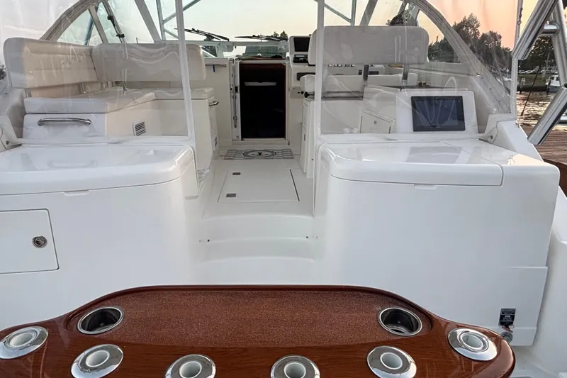  Yacht Photos Pics 2010 Cabo 36 Express yacht interior with seating and control panel.